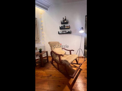 ‎كرسي هزاز خشب زان لون بني vintage chair