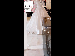 فستان زفاف هاند ميد لابسه واحده - 2