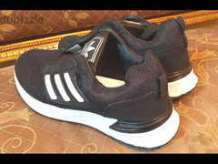 حذاء ماركة ( Adidas ) مقاس 45 . جديد لانج لم يستخدم . اللون : اسود - 4