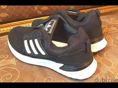 حذاء ماركة ( Adidas ) مقاس 45 . جديد لانج لم يستخدم . اللون : اسود - 6
