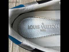 Louis Vuitton ‏Versace HUGO BOSS Tod's ‏Prada Tod's Gucci Philipp ‏AX - 5