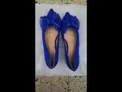 حذاء ازرق بفيونكا لون ازرق مقاس ٤١ جديد