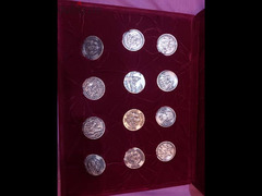 مجموعه ميداليات من الفضه الخالصه