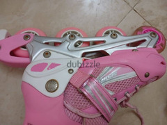 pink rolling skates