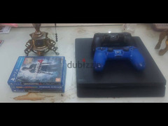 PlayStation 4 slim + 2 controls + 4 games