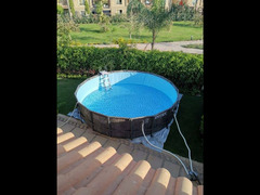 Intex pool with electric vacuum + water suction