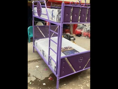 سرير اطفال دورين حديد 120 متر  لون موف بالملل و المراتب