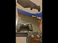 PS4 Slim 1TB with 2 orignal controllers