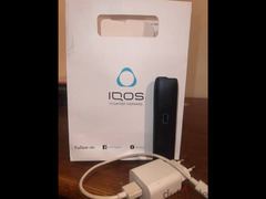 IQOS with its box and original charger