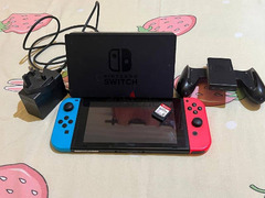 Nintendo switch with super smash bros *USED LIKE NEW*