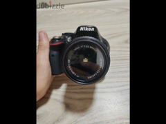 Camera Nikon D5200 
lens 18-55

All accessories included