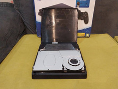 PS4 Slim 500GB.   +   GTA.  + 2 controller.  + وصلات - 4