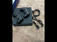 playstation 4 slim 500 giga with tow controllers - 5
