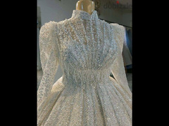 فستان زفاف ملكي خامات مستورده ومتوفر تشكيله مميزه باسعار مناسبه جدا - 2