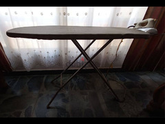 Used iron and iron table. - 2