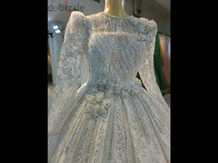 فستان زفاف ملكي خامات مستورده ومتوفر تشكيله مميزه باسعار مناسبه جدا - 5