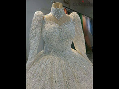 فستان زفاف ملكي خامات مستورده ومتوفر تشكيله مميزه باسعار مناسبه جدا - 6