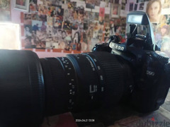 كاميرا نيكون D90 مع عدسه 70/300