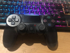 PS4 controller used like New - 3