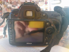 كاميرا نيكون D90 مع عدسه 70/300 - 6