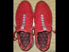 nike sneakers. . . running fit . red color.  reflection parts. Vietnam