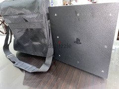 PS4 Pro with two free games and a bag! - 4