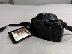 nikon d5100+18-55 lens + flash + tripod for sale